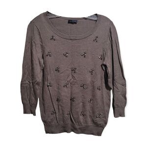 The limited jeweled sweater